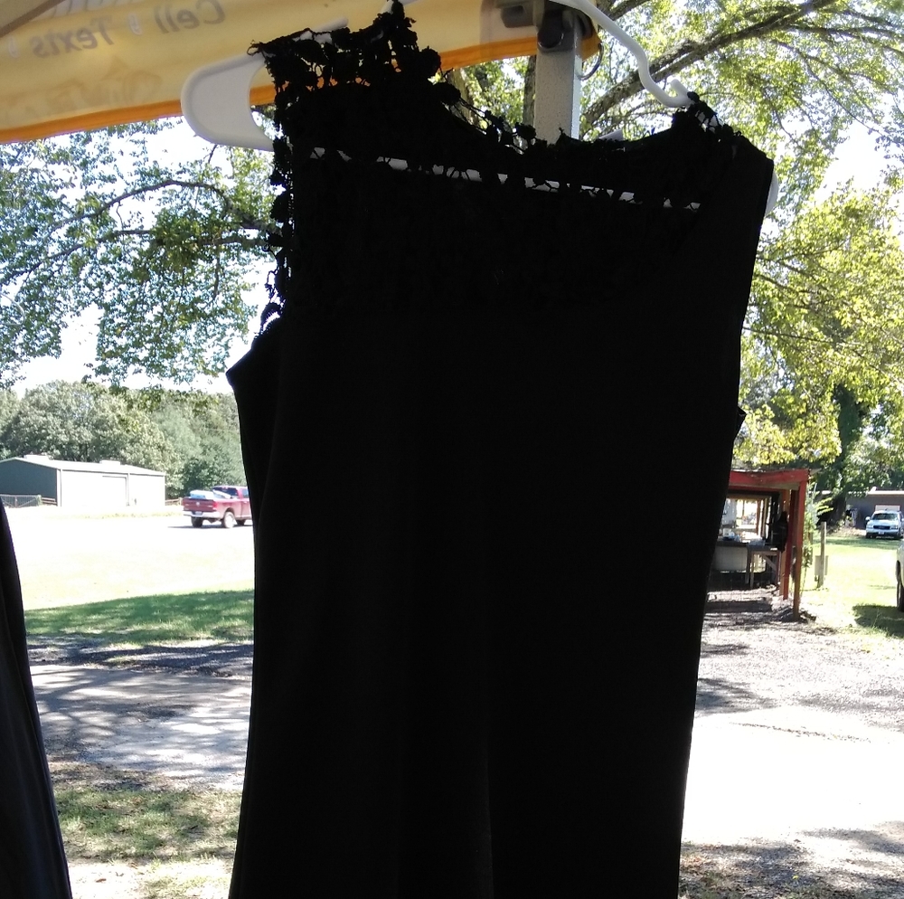 A black lace finish dress